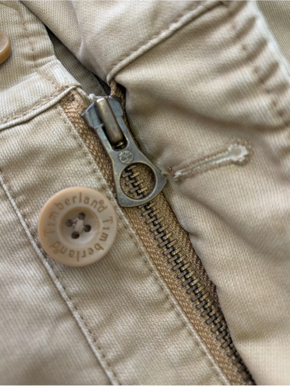 Timberland men’s military/field-style jacket in tan/khaki, size Small.